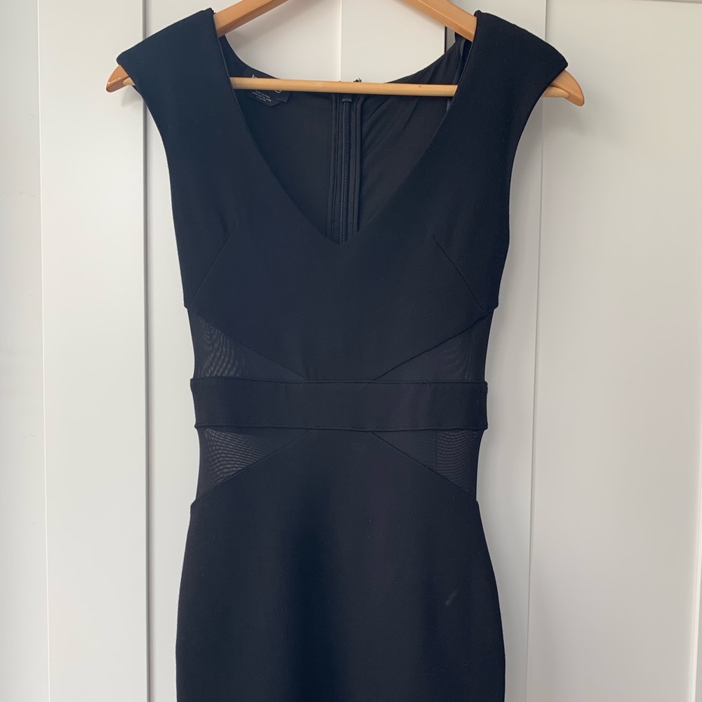 Black Bebe vneck body con dress with mesh sides